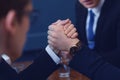 Business armwrestling in office