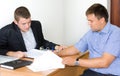 Two businessmen discussing a contract Royalty Free Stock Photo