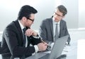 Two businessmen discussing at office during business meeting Royalty Free Stock Photo