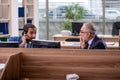 Two businessmen employees working in the office Royalty Free Stock Photo