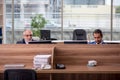 Two businessmen employees working in the office Royalty Free Stock Photo