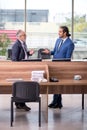 Two businessmen employees working in the office Royalty Free Stock Photo