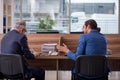 Two businessmen employees working in the office Royalty Free Stock Photo