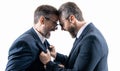 two businessmen fighting at rivalry isolated on white. businessmen having conflict fight in business. fighting between