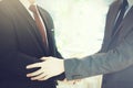 Two businessmen giving warm welcome, trust, teamwork, agreement to each other Royalty Free Stock Photo
