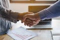 Two businessmen handshaking in meeting after final project agreement deal done Royalty Free Stock Photo