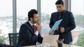 Two businessmen having business discussion in meeting at office Royalty Free Stock Photo