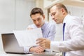 Two businessmen having discussion in office