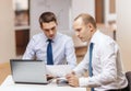 Two businessmen having discussion in office Royalty Free Stock Photo