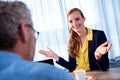 Two businessmen interacting and smiling Royalty Free Stock Photo