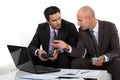 Two businessmen preparing proposal