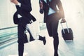 Two businessmen rushing through an airport to catch a flight Royalty Free Stock Photo