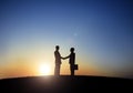 Two Businessmen Shaking Hand in Back Lit Royalty Free Stock Photo