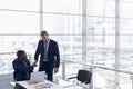 Two businessmen shaking hands in office Royalty Free Stock Photo