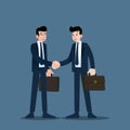 Two Businessmen standing and shake hands each other for cooperation and make a deal. Royalty Free Stock Photo