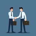 Two Businessmen standing and shake hands each other for cooperation and make a deal. Royalty Free Stock Photo