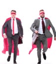 Two businessmen in superhero capes running forward