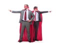 Two businessmen in superhero raincoats pointing in different directions.