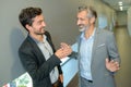 Two businessmen talkingwhile taking coffee break Royalty Free Stock Photo