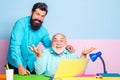 Two businessmen. Two business colleagues at meeting in modern color office interior. Two male senior man employees Royalty Free Stock Photo