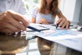 Two Businesspeople Analyzing Graph Royalty Free Stock Photo