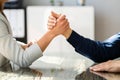 Two Businesspeople Competing In Arm Wrestling Royalty Free Stock Photo