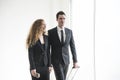 Two businesspeople discussing for partner business while walking