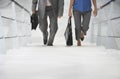 Two Businesspeople Walking Up Stairs