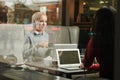 Young women in coffee shop Royalty Free Stock Photo