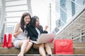 Two businesswomen online shopping laptop computer with successful emotion. Business entrepreneur using internet and making Royalty Free Stock Photo