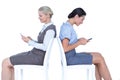 Two businesswomen using smartphone Royalty Free Stock Photo