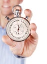 Two buttons stopwatch in outstretched hand Royalty Free Stock Photo