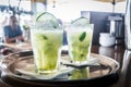 Two caipirinha cocktails on a bar counter Royalty Free Stock Photo