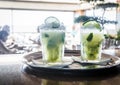 Two caipirinha cocktails on a bar counter Royalty Free Stock Photo
