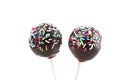 Two cakepops with colored decoration