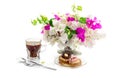 Two cakes, a bouquet of flowers and a cup of coffee Royalty Free Stock Photo