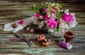 Two cakes, a bouquet of flowers and a cup of coffee Royalty Free Stock Photo