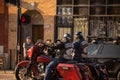 Two California Mongols bikers riding motorcycles on an open road