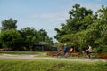 Two Cambodian male ride their bicycle to go somewhere. Bicycle is one of the main transportation in Cambodia.