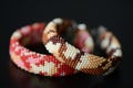 Two camouflage bracelets on a dark background Royalty Free Stock Photo