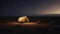 Two campers outside tent in desert at night Royalty Free Stock Photo