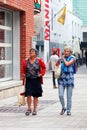 Two Canadian elderly women walking on the street in Montreal