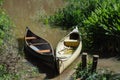 Two canoes lying idyllic on a river delta shore in Argentina Royalty Free Stock Photo