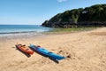 two canoes, Barafundle Beach,Bay near Stackpole,Pembrokeshire,Wales,U.K Royalty Free Stock Photo