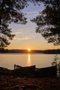 Two canoes on shore at sunrise Royalty Free Stock Photo