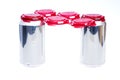 Two cans of a favorite beverage in a holder Royalty Free Stock Photo