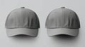 Two caps in different angles on a monochrome background. Mock up, material for mounting and presentation of logos Royalty Free Stock Photo