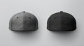 Two caps in different angles on a monochrome background. Mock up, material for mounting and presentation of logos Royalty Free Stock Photo