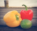 Two capsicums with lemon Royalty Free Stock Photo