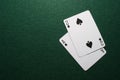 Two cards on green felt Royalty Free Stock Photo